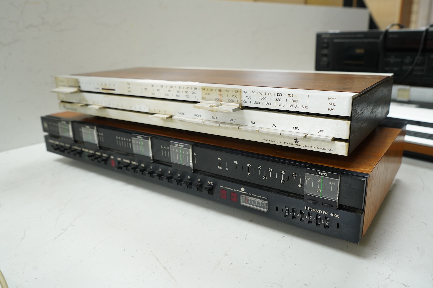 Four Bang & Olufsen stereo items; a Beogram 1000 type 5229 turntable, a Beomaster 4000 type 2406, a Beomaster 901 type 2606, and a Beomaster 1900 type 2903